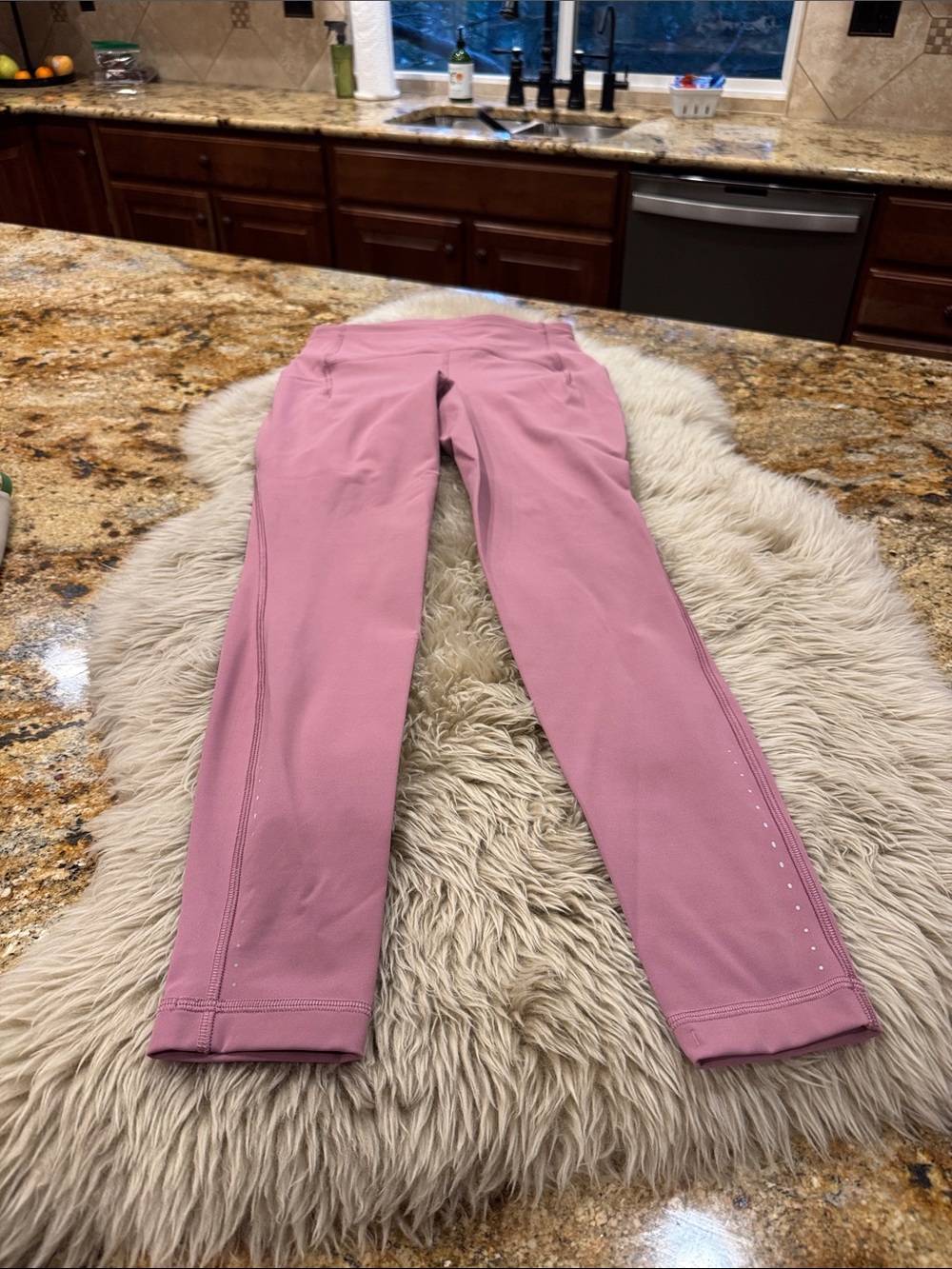 Lululemon Fast and Free with pockets 28” leggings. Size 6 pinkish color. Like ne
